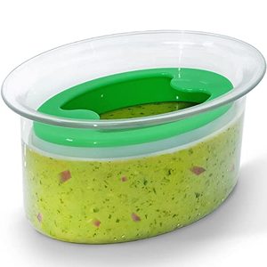 Preserve the Freshness of Your Guacamole from Browning by Sealing it in an Airtight Storage Container